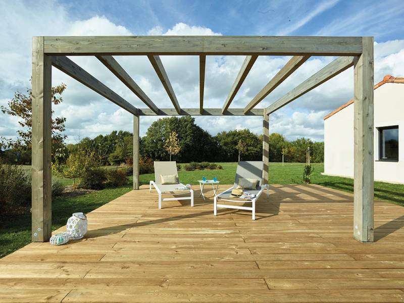 Photo de l'aménagement exterieur d'un salon de jardin avec terrasse et pergola en bois naturel sur mesure de 4 m ² pour un espace de vie confortable par Daniel Moquet Aix-en-Provence